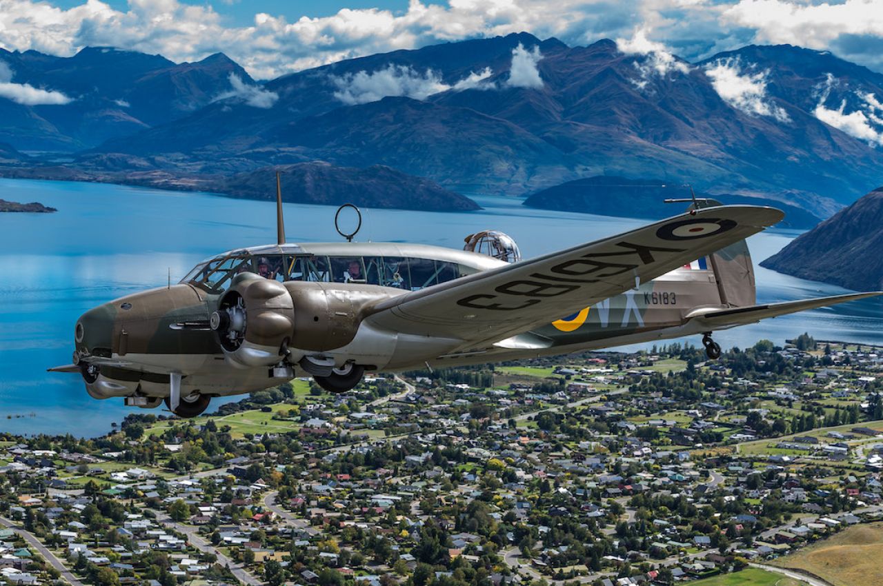 Warbirds Over Wanaka SZ Avro Anson Over Lake Wanaka Image Courtesy Warbirds Over Wanaka