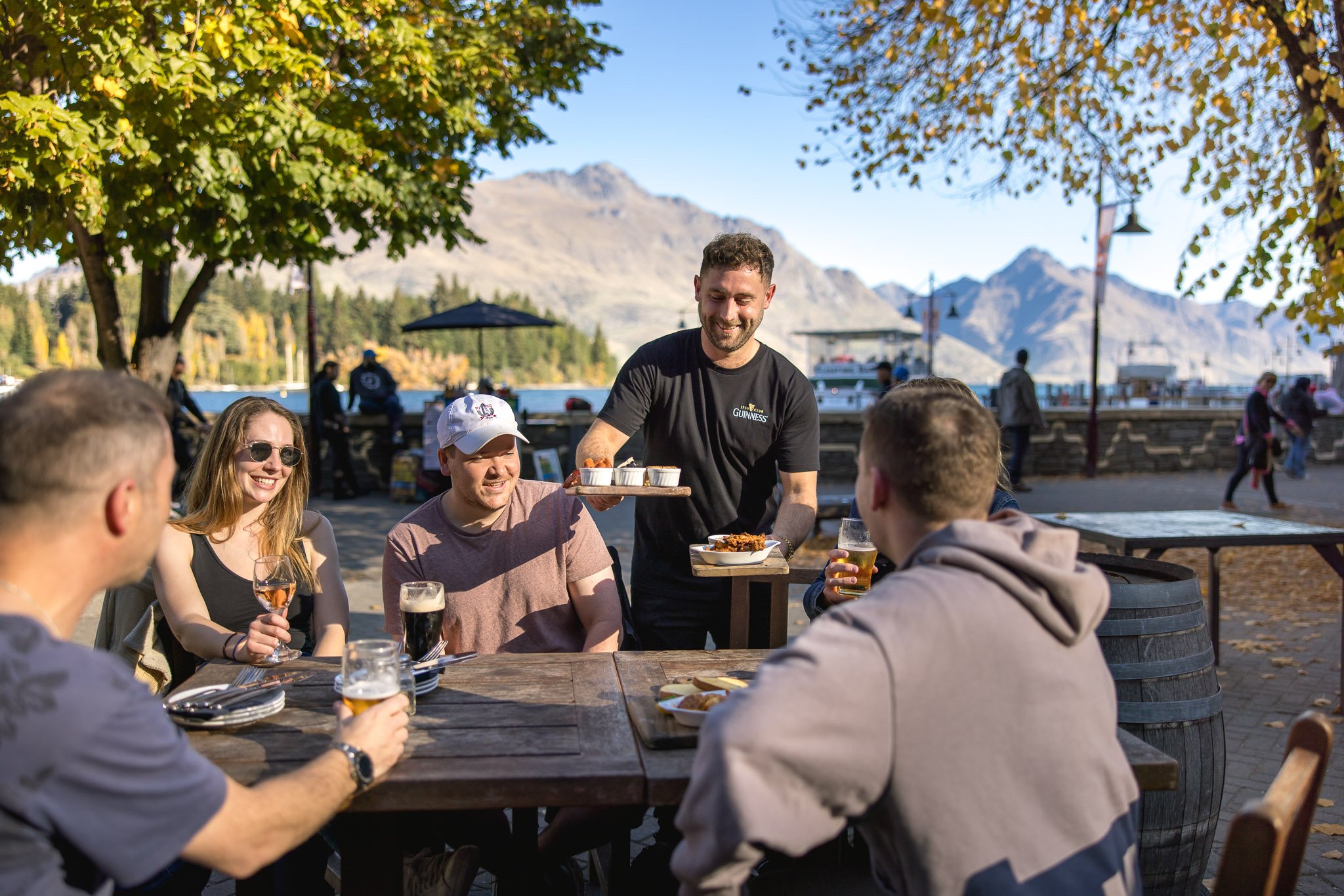 Enjoying Queenstown's views and local produce at Pog Mahone's